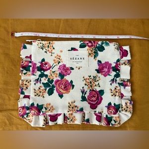 Never been used Sezane flowery canvas clutch